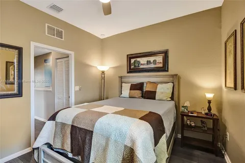 a view of a swimming pool and lounge chair