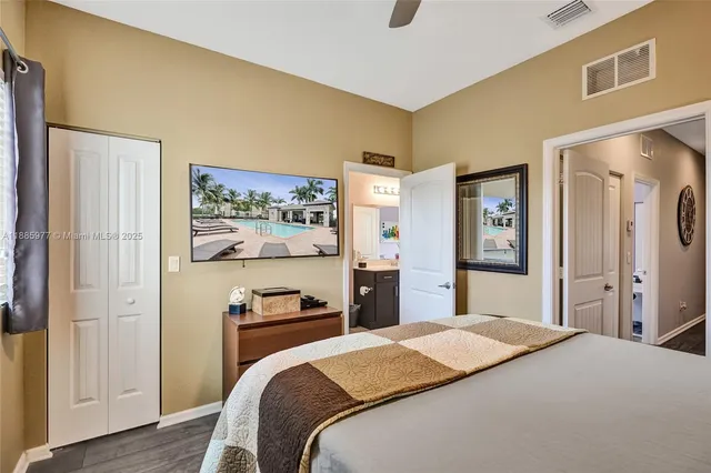 a view of a swimming pool and lounge chairs