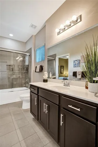 a view of swimming pool with outdoor seating and lake view