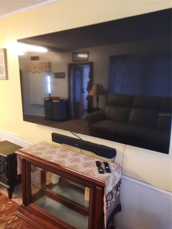 4 Palm Place Tavares, FL 32778 - Photo 9 of 20 a view of kitchen and utility room