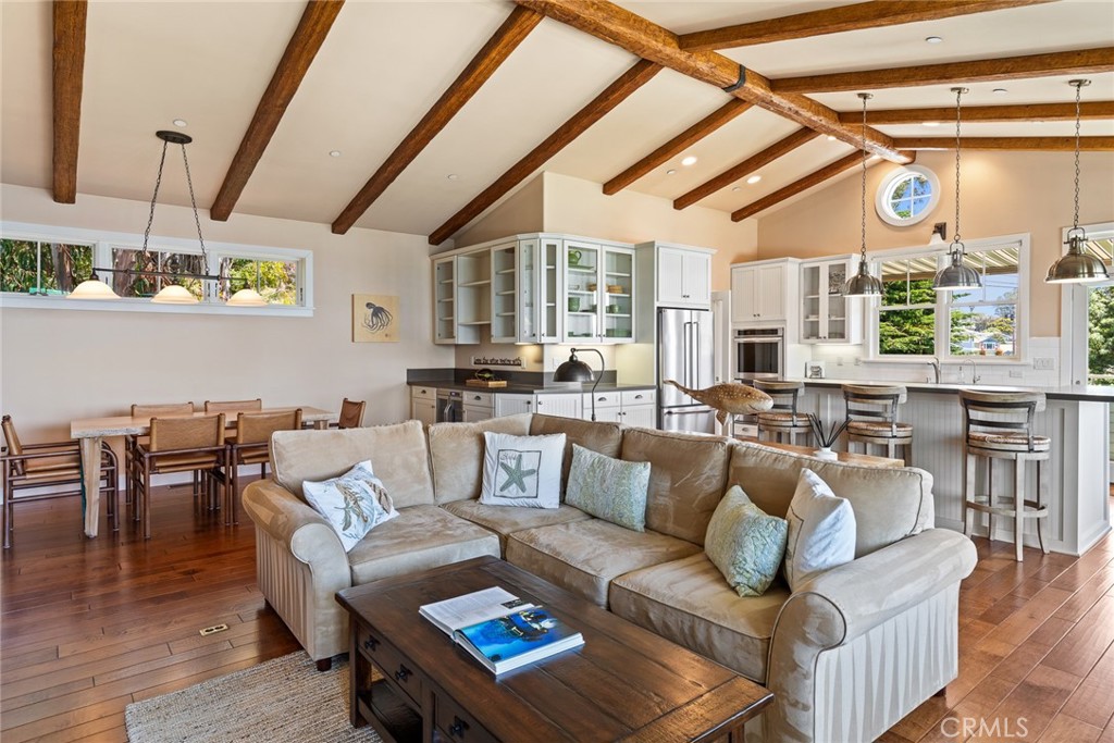 281 Main Street Morro Bay, CA 93442 - Photo 13 of 69 a living room with furniture and a large window