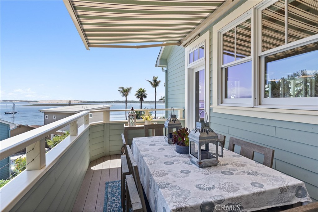 281 Main Street Morro Bay, CA 93442 - Photo 24 of 69 a dining room with furniture and wooden floor