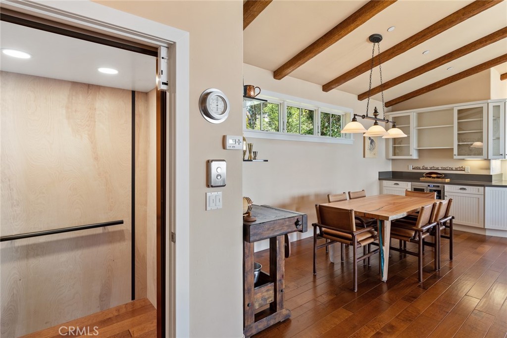 281 Main Street Morro Bay, CA 93442 - Photo 34 of 69 a view of a dining room with furniture window and wooden floor