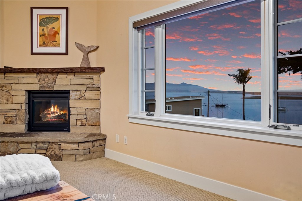 281 Main Street Morro Bay, CA 93442 - Photo 38 of 69 a living room with furniture and a fireplace