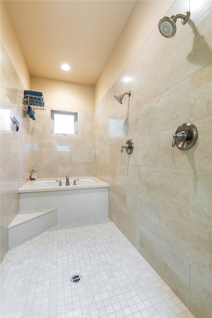 281 Main Street Morro Bay, CA 93442 - Photo 47 of 69 a bathroom with a bathtub and shower