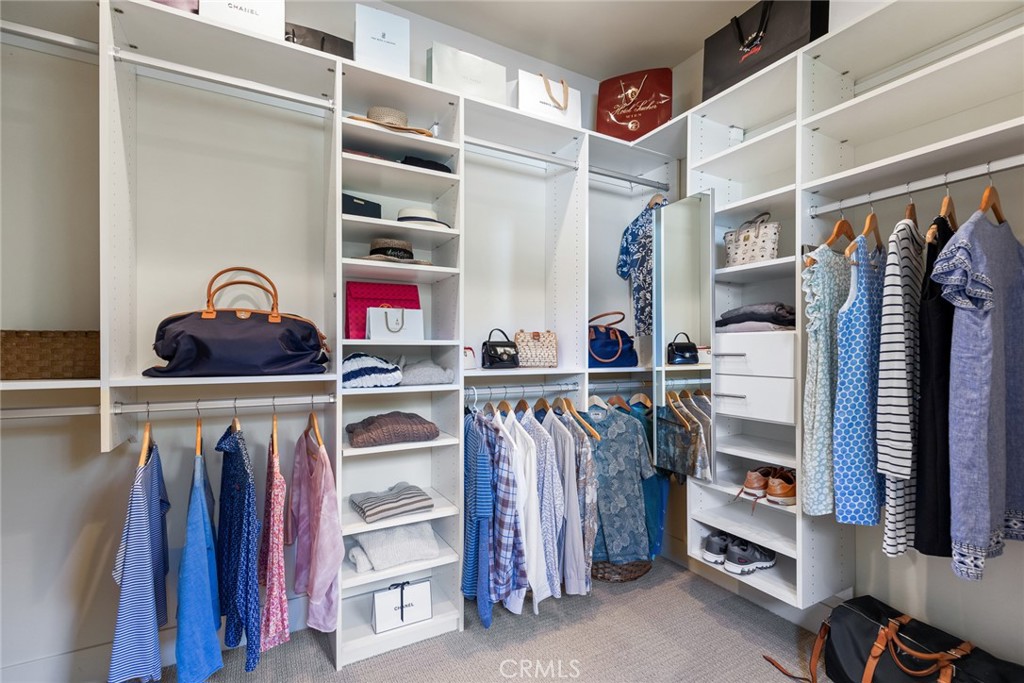 281 Main Street Morro Bay, CA 93442 - Photo 50 of 69 a view of walk in closet with clothes and shoes