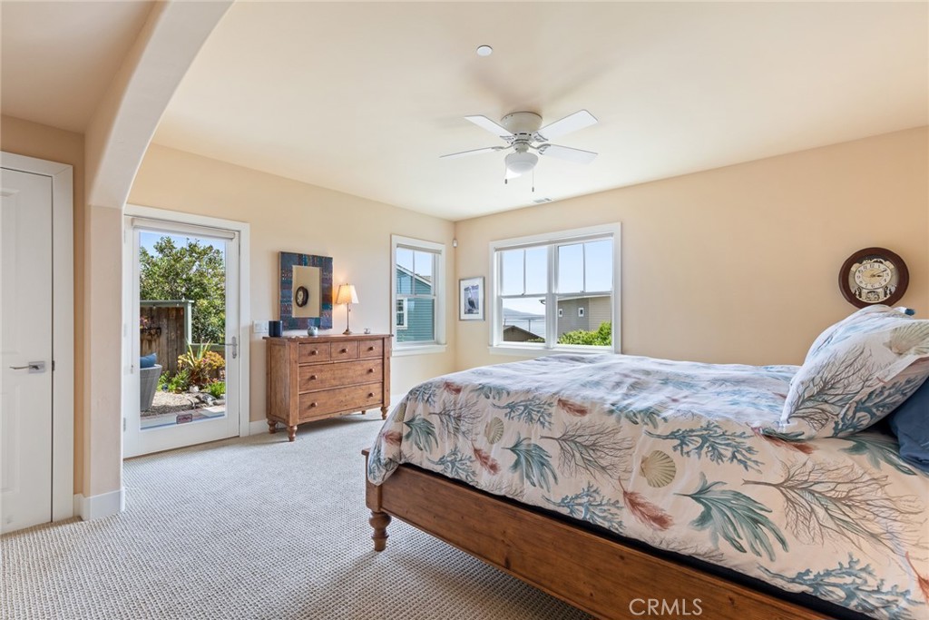 281 Main Street Morro Bay, CA 93442 - Photo 58 of 69 a bedroom with a large bed and a window