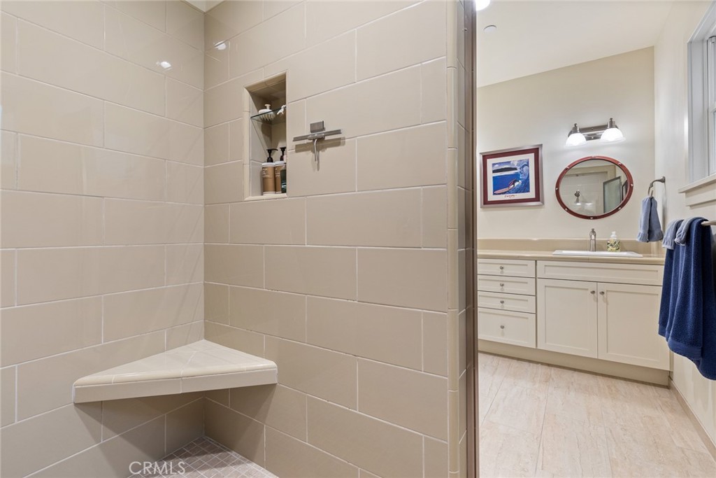 281 Main Street Morro Bay, CA 93442 - Photo 62 of 69 a bathroom with a sink a toilet and a shower