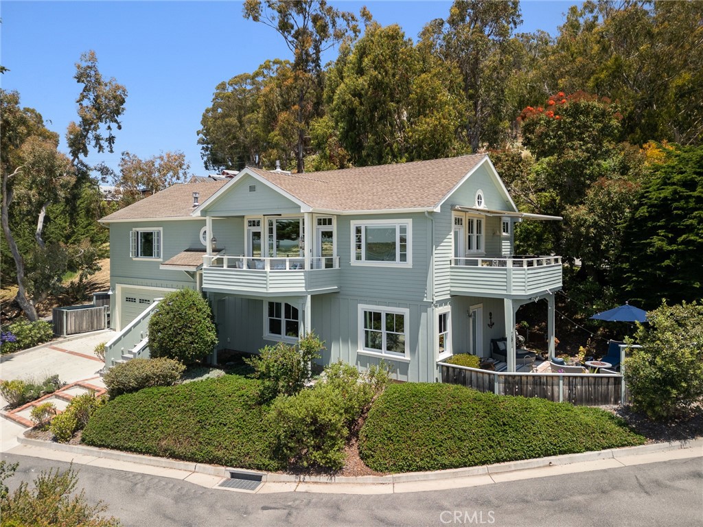 281 Main Street Morro Bay, CA 93442 - Photo 66 of 69 a front view of a house with a garden
