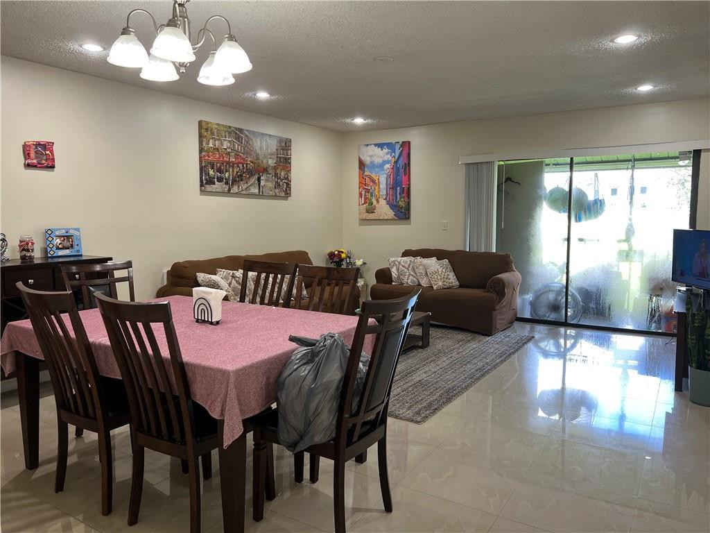 22415 Southwest 61st Way, Unit 202 Boca Raton, FL 33428 - Photo 6 of 22 Dining and Living Areas