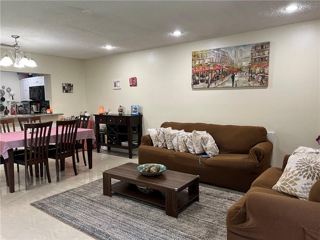 22415 Southwest 61st Way, Unit 202 Boca Raton, FL 33428 - Photo 8 of 22 Living Room