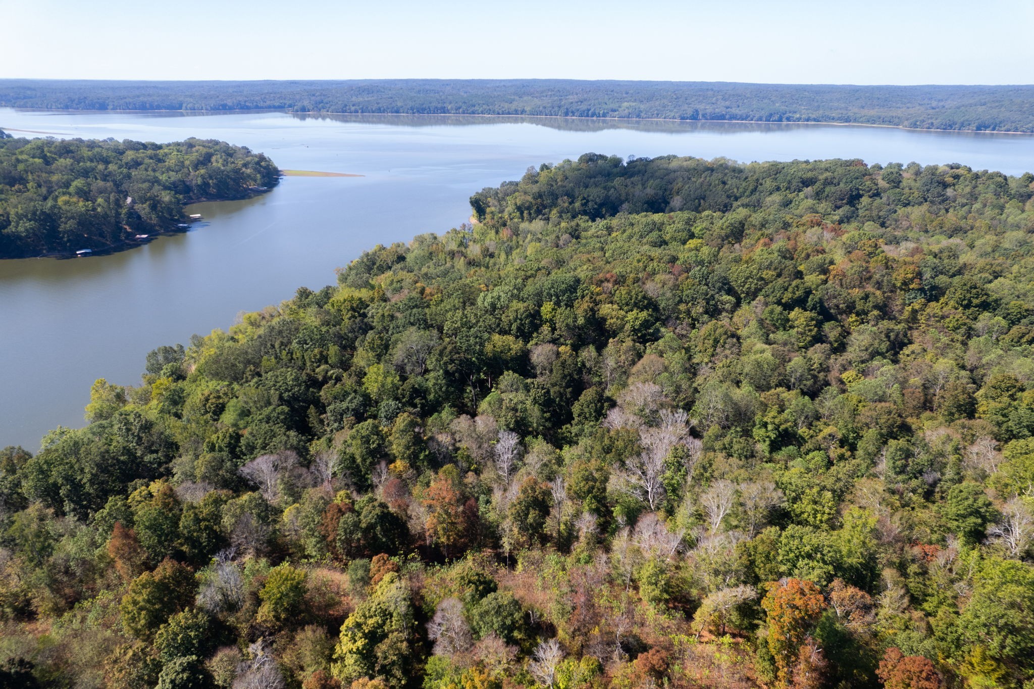 0 Lock E Road Cadiz, KY 42211 - Photo 21 of 88 a view of a lake with a mountain in the background