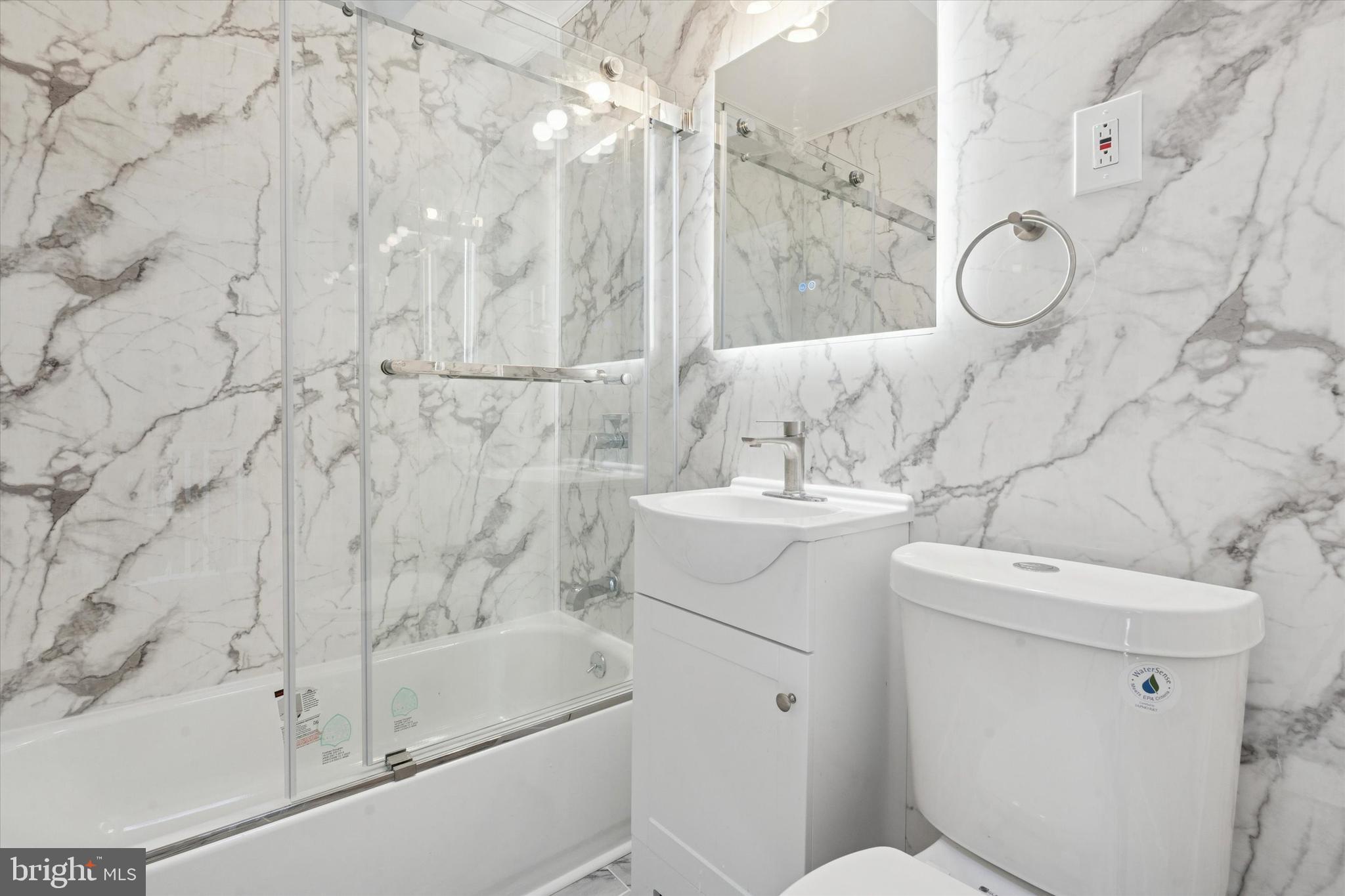 6340 Cardiff Street Philadelphia, PA 19149 - Photo 13 of 20 a bathroom with a sink toilet and shower