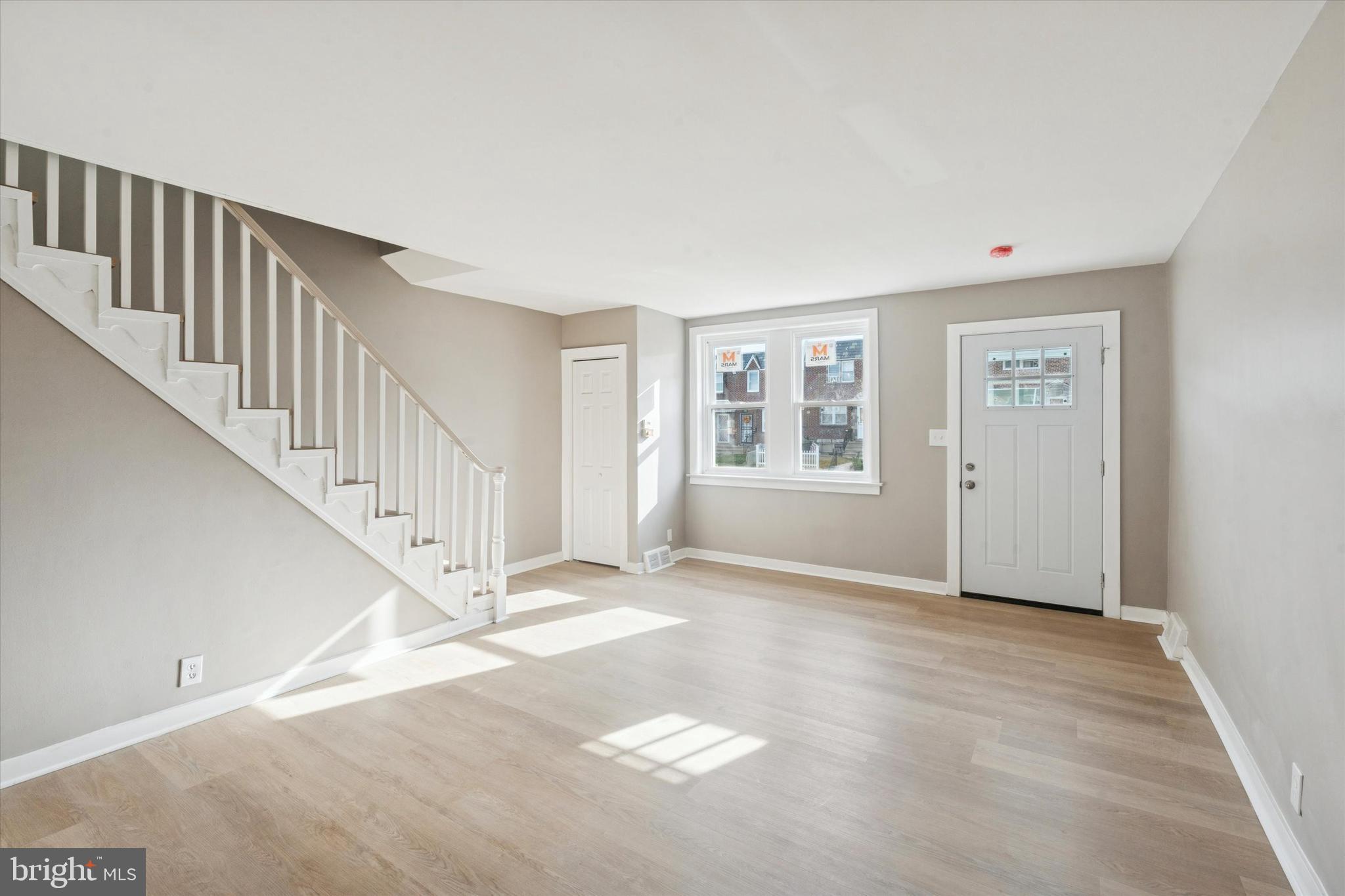 6340 Cardiff Street Philadelphia, PA 19149 - Photo 4 of 20 a view of an empty room with stairs