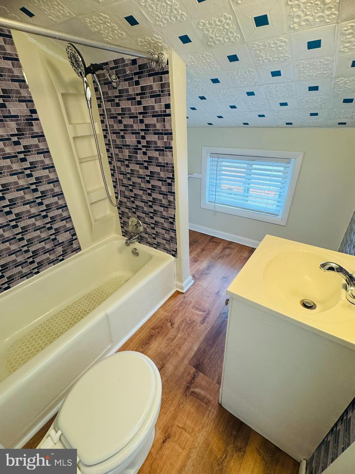 25 Degrange Street Frederick, MD 21701 - Photo 16 of 19 a bathroom with a bathtub and shower