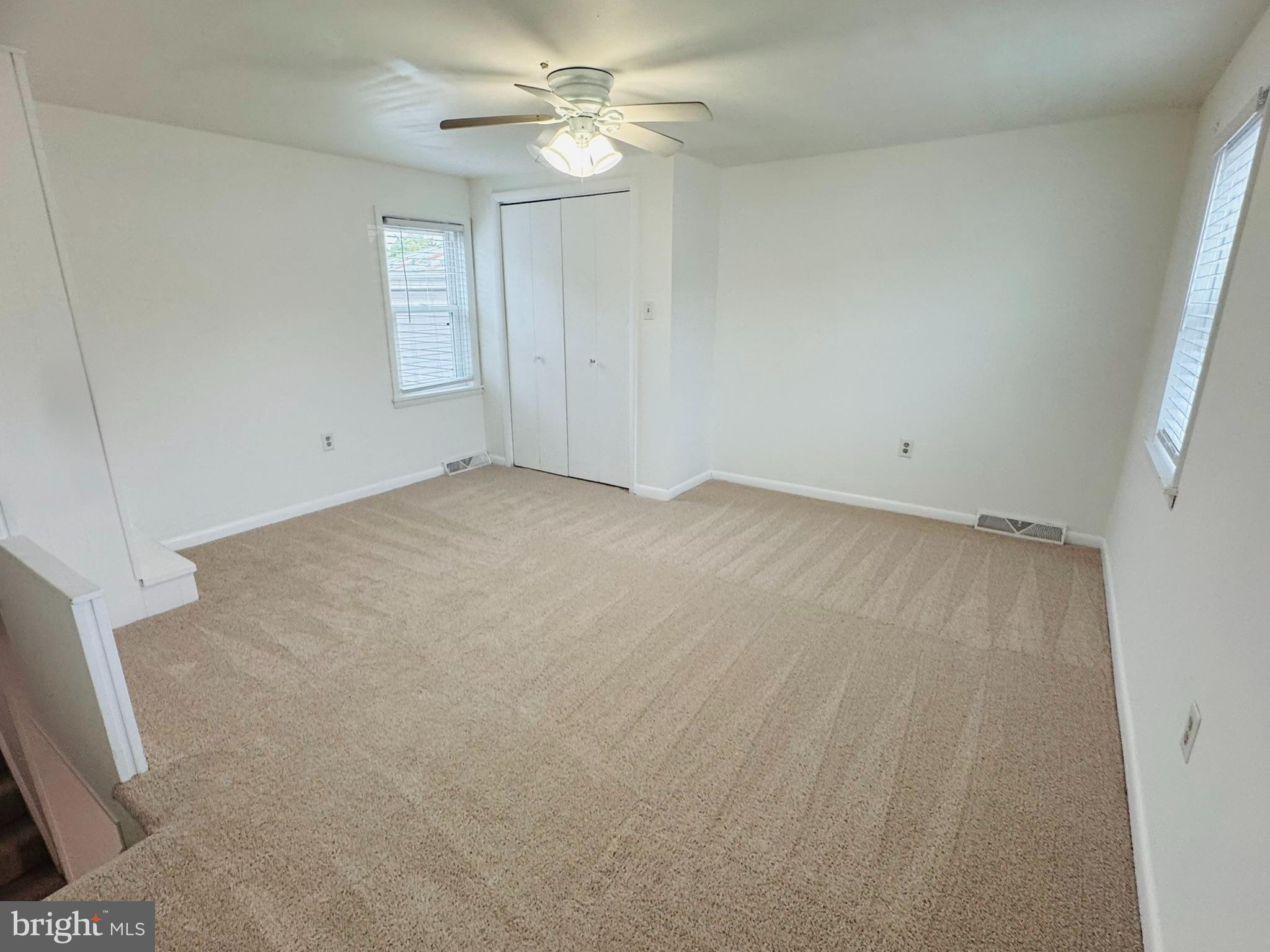 25 Degrange Street Frederick, MD 21701 - Photo 9 of 19 an empty room with windows and fan