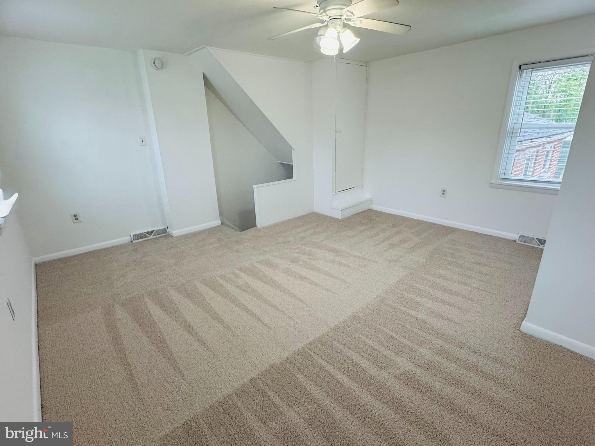 25 Degrange Street Frederick, MD 21701 - Photo 10 of 19 a view of an empty room with a chandelier fan