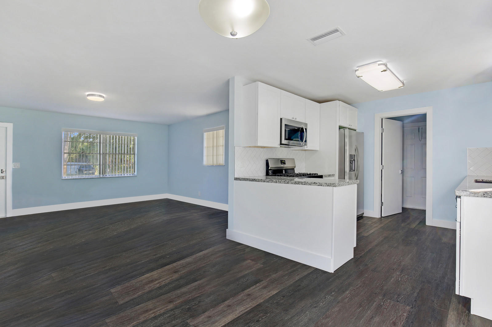 401 West 37th Street Riviera Beach, FL 33404 - Photo 4 of 17 Kitchen & Living Room