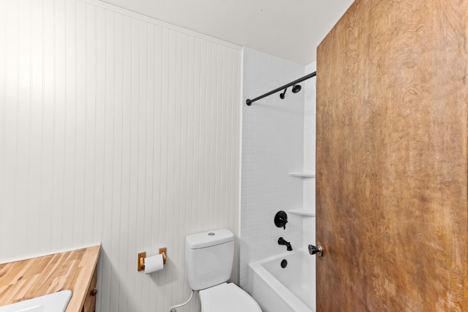 3395 Meadow Way Rocklin, CA 95677 - Photo 20 of 35 a bathroom with a toilet and a shower