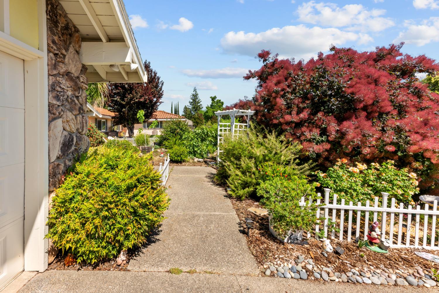 3395 Meadow Way Rocklin, CA 95677 - Photo 33 of 35 a view of a pathway with flowers