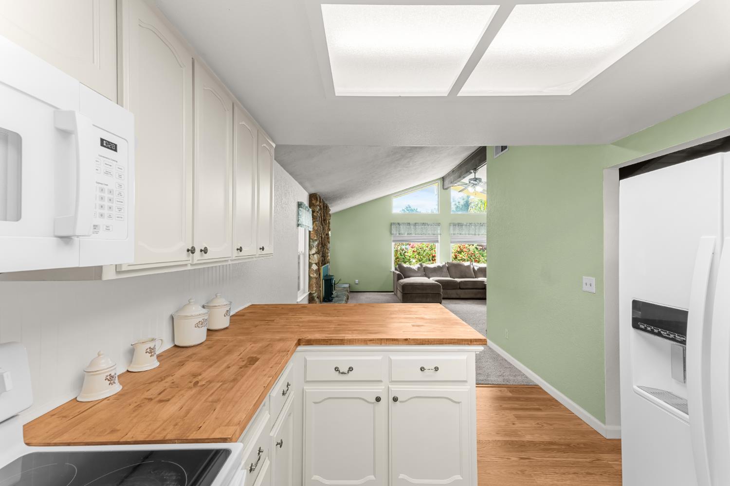 3395 Meadow Way Rocklin, CA 95677 - Photo 10 of 35 a kitchen with granite countertop a sink and cabinets