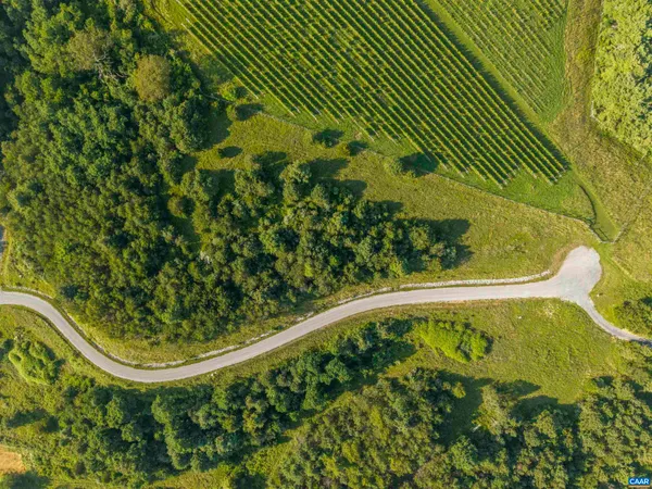 a view of a swimming pool from a balcony