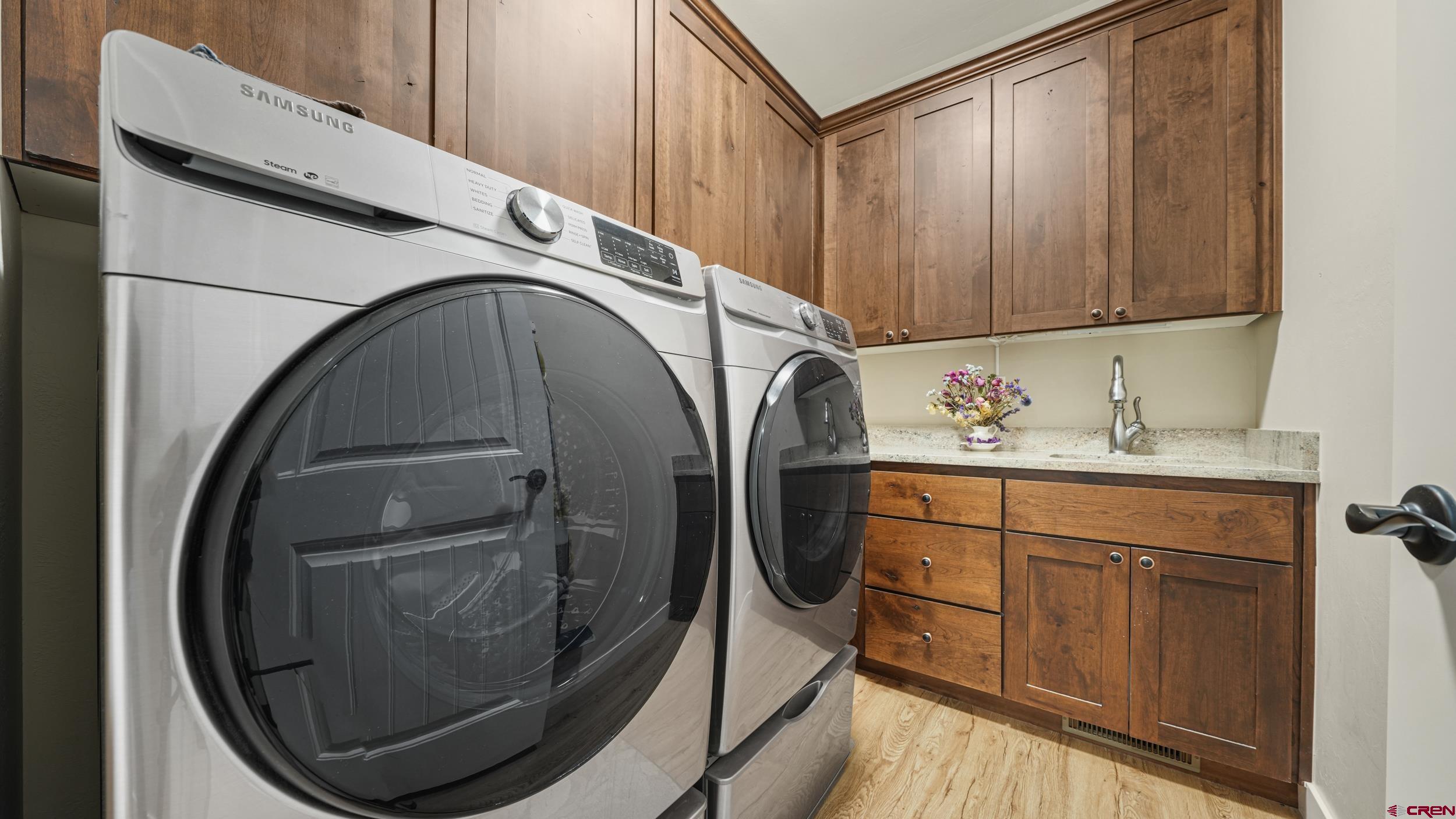 2042 Constitution Loop Montrose, CO 81401 - Photo 24 of 42 a utility room with dryer and washer