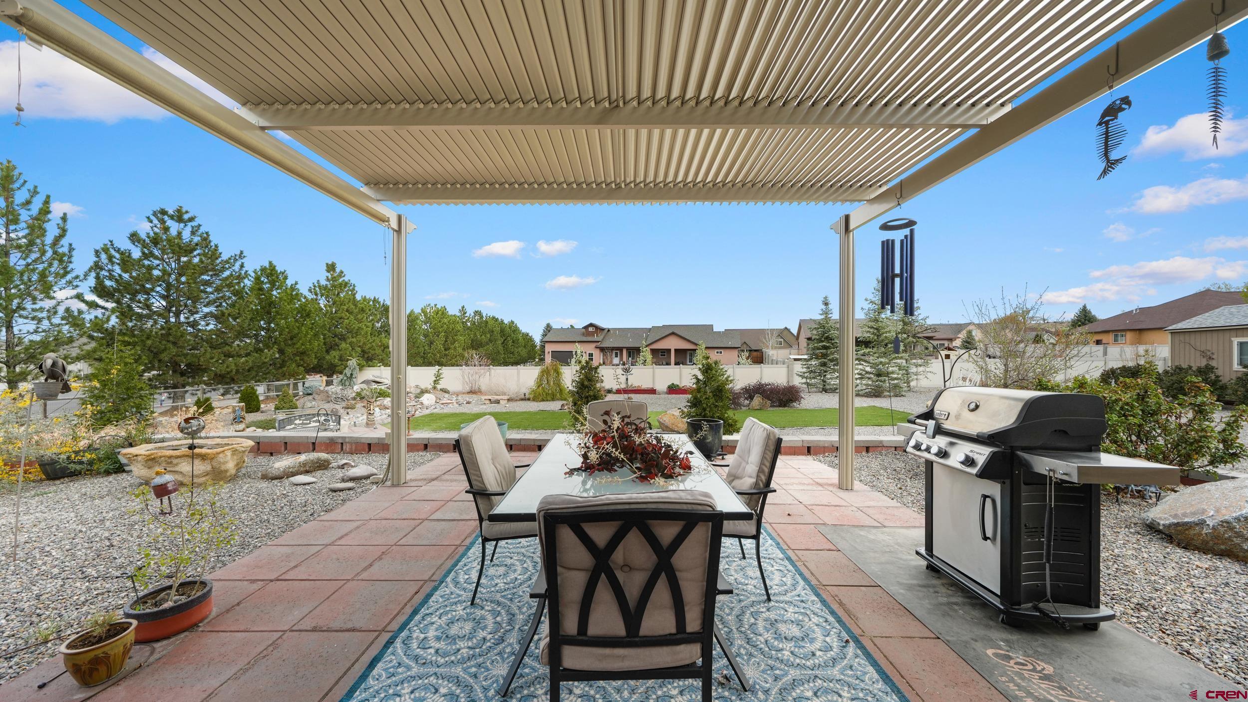 2042 Constitution Loop Montrose, CO 81401 - Photo 31 of 42 a view of a terrace with furniture
