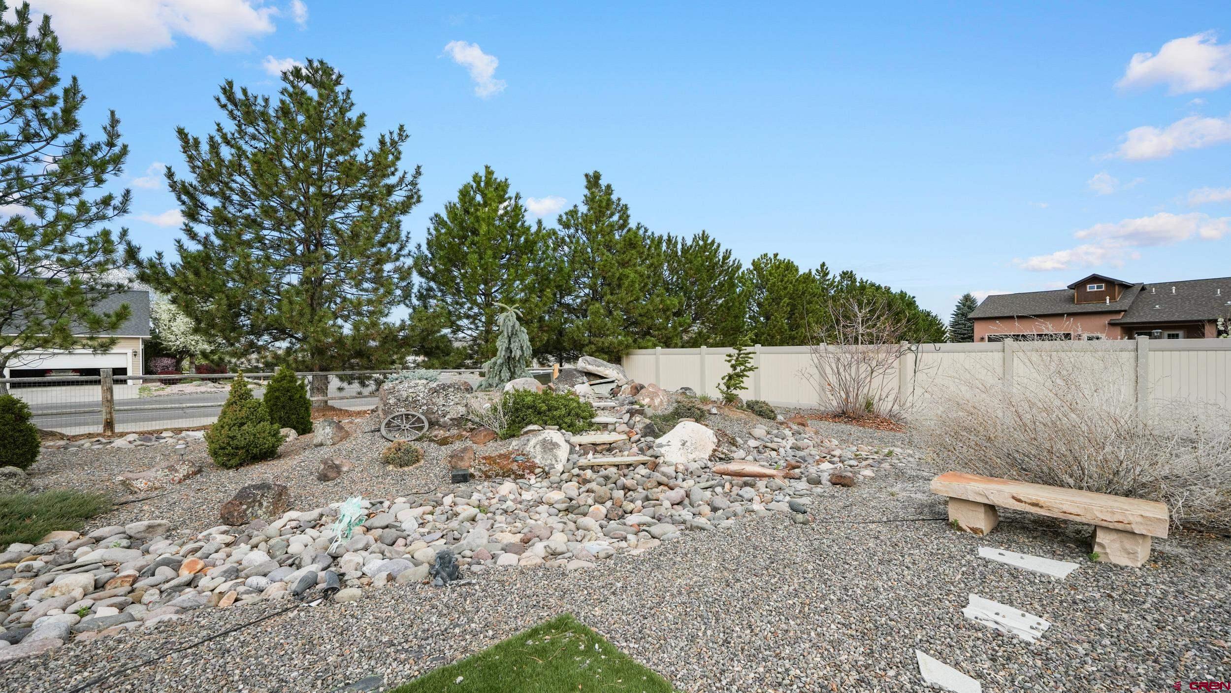 2042 Constitution Loop Montrose, CO 81401 - Photo 33 of 42 a view of a backyard of the house