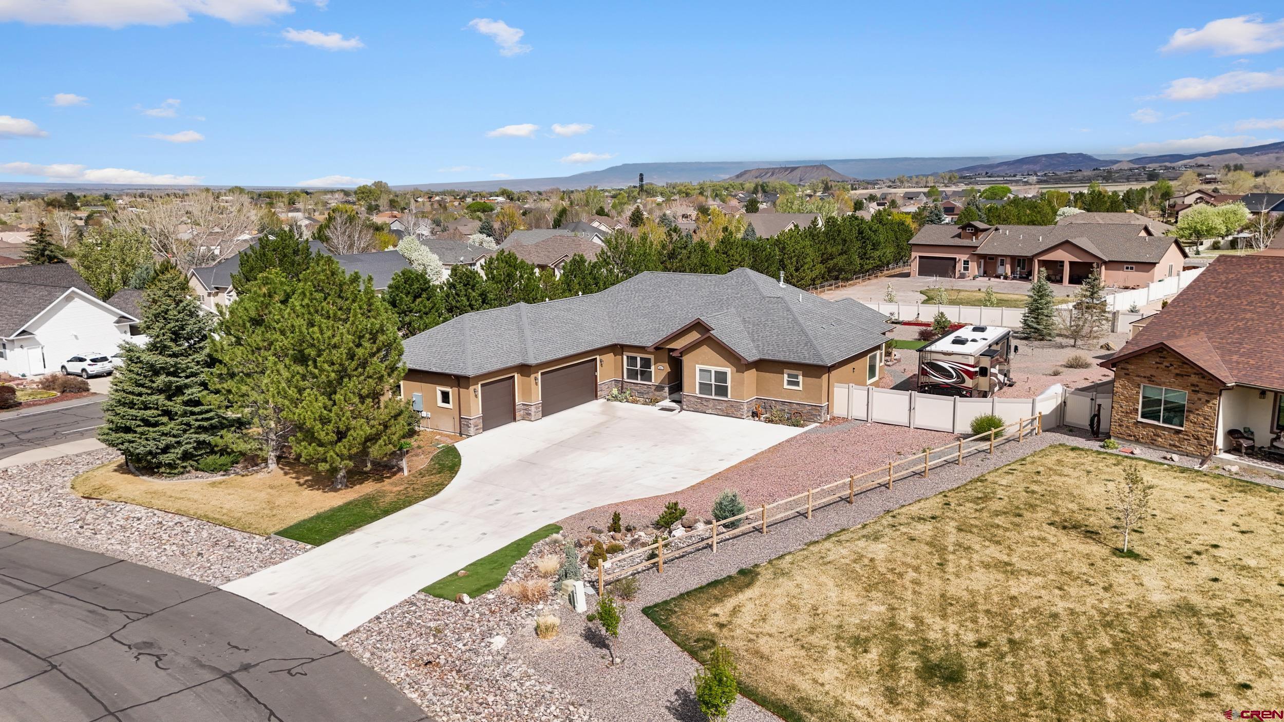 2042 Constitution Loop Montrose, CO 81401 - Photo 37 of 42 an aerial view of residential houses with outdoor space