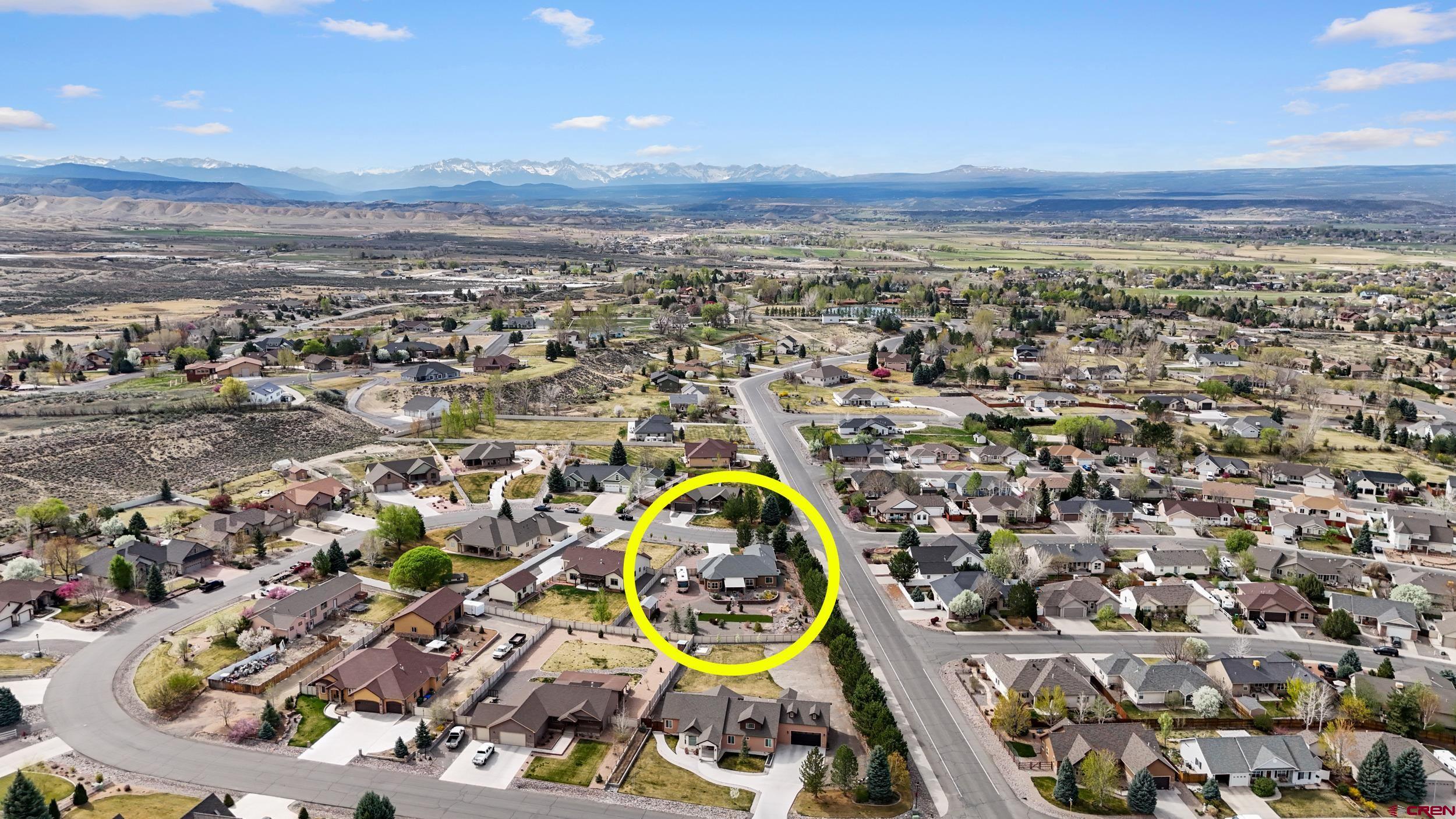 2042 Constitution Loop Montrose, CO 81401 - Photo 41 of 42 an aerial view of residential houses with outdoor space
