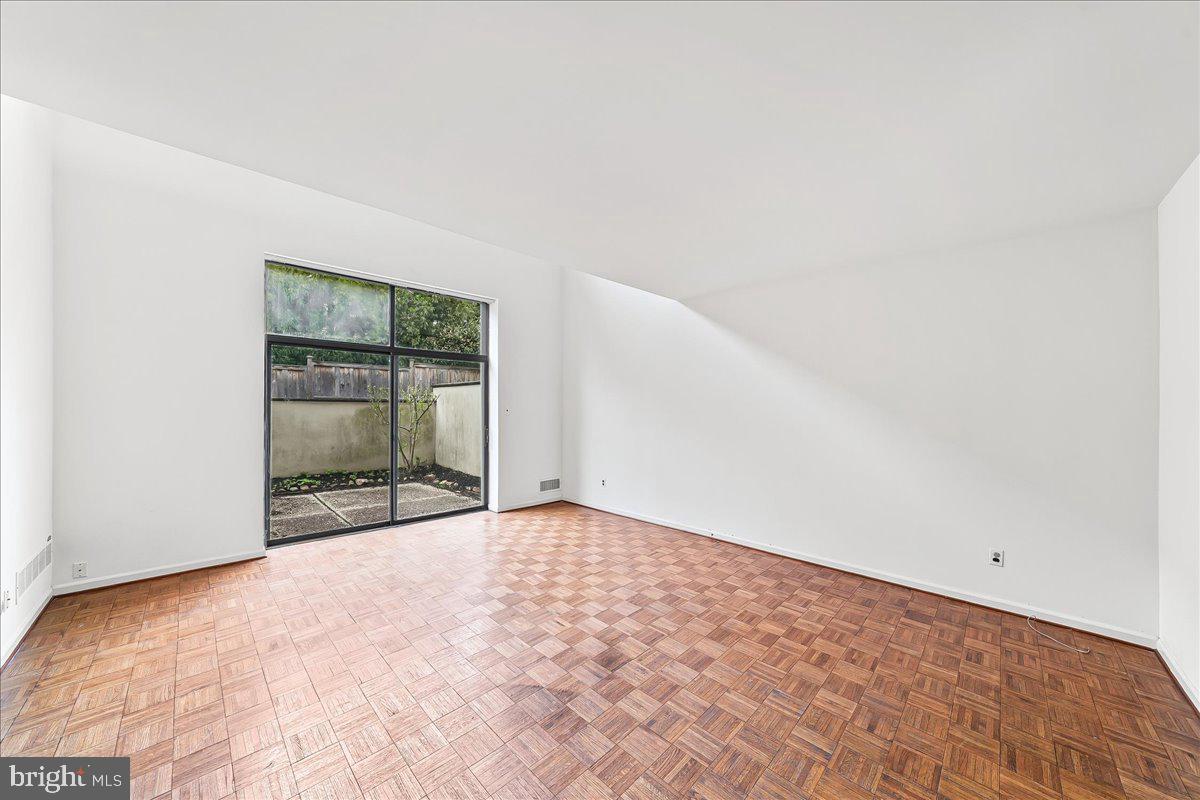 100 Llanalew Road, Unit 3C Haverford, PA 19041 - Photo 6 of 33 Living Room with Slider to Patio