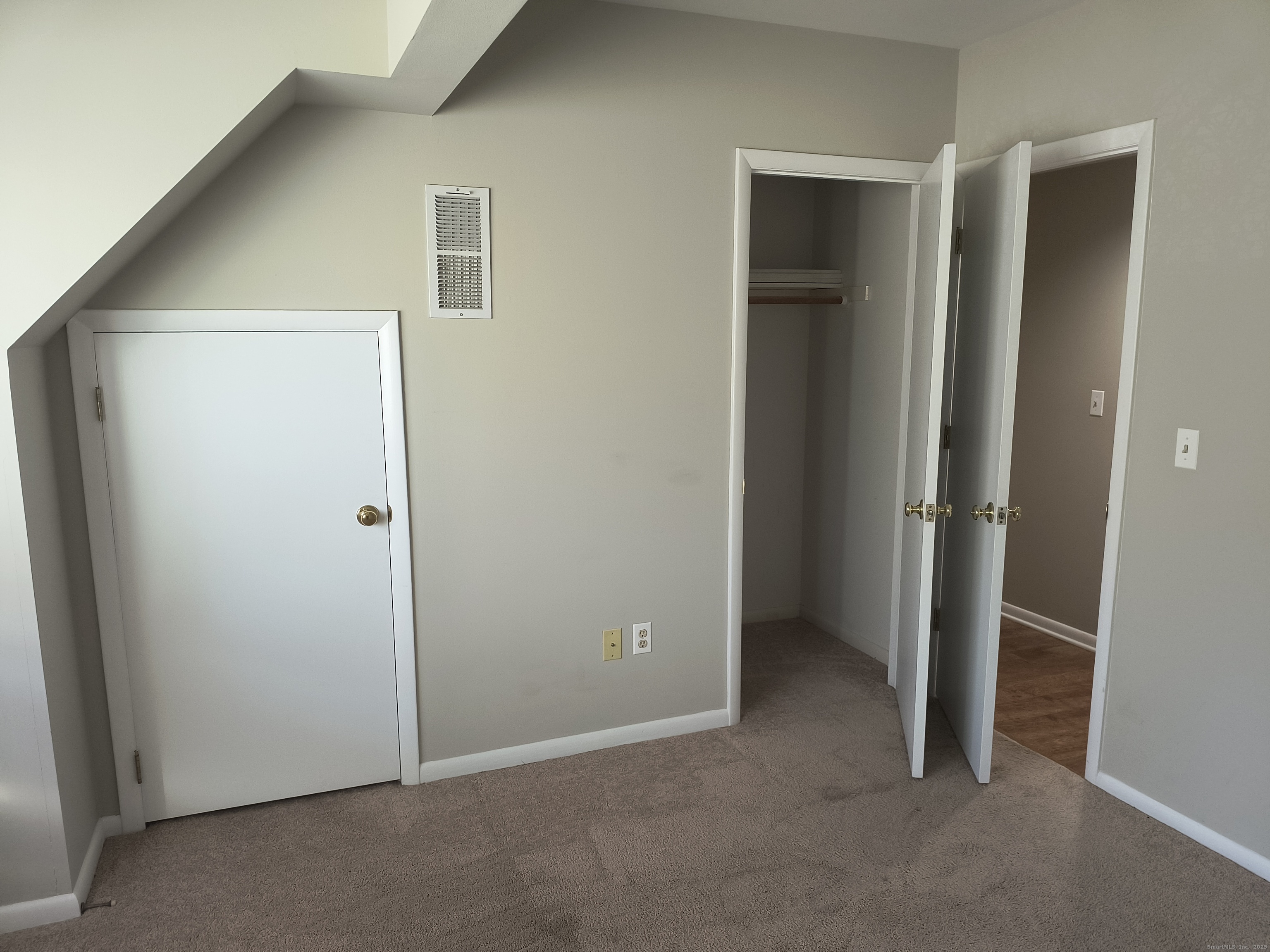 532 Popes Island Road, Unit 532 Milford, CT 06461 - Photo 18 of 23 an empty room with closet