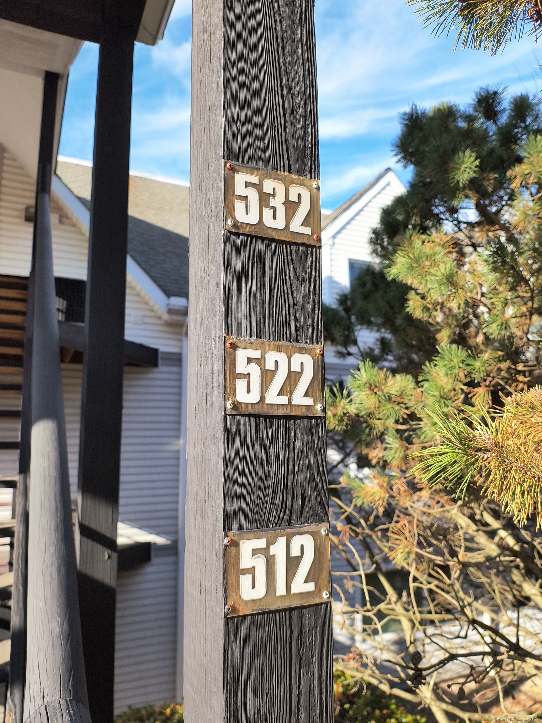532 Popes Island Road, Unit 532 Milford, CT 06461 - Photo 2 of 23 a view of an entryway with a tree