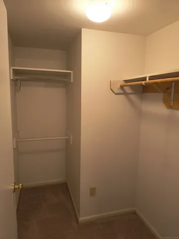 a view of a room with racks on the wall