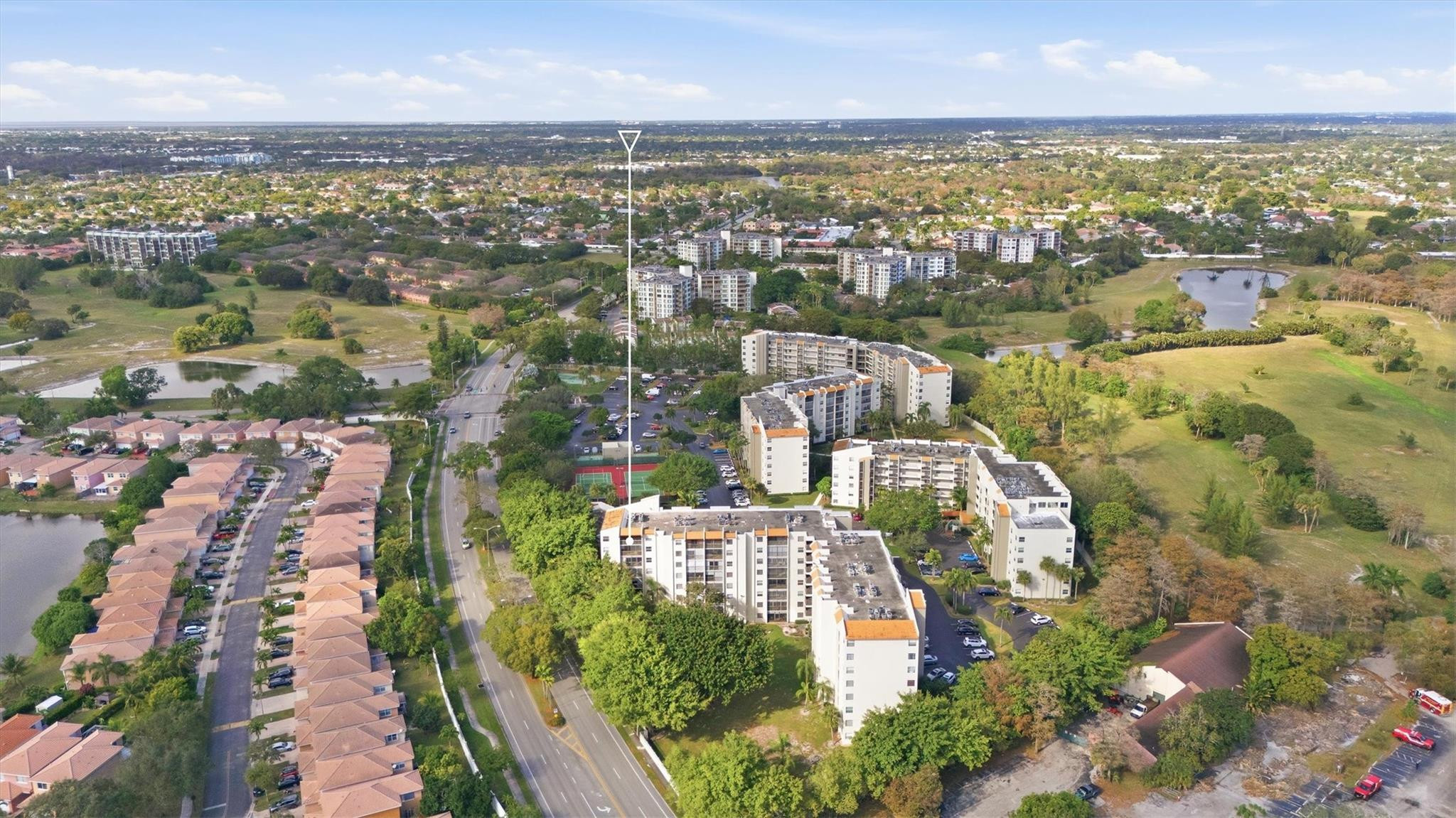 3910 Inverrary Boulevard, Unit 708B Lauderhill, FL 33319 - Photo 42 of 58 an aerial view of residential houses with outdoor space