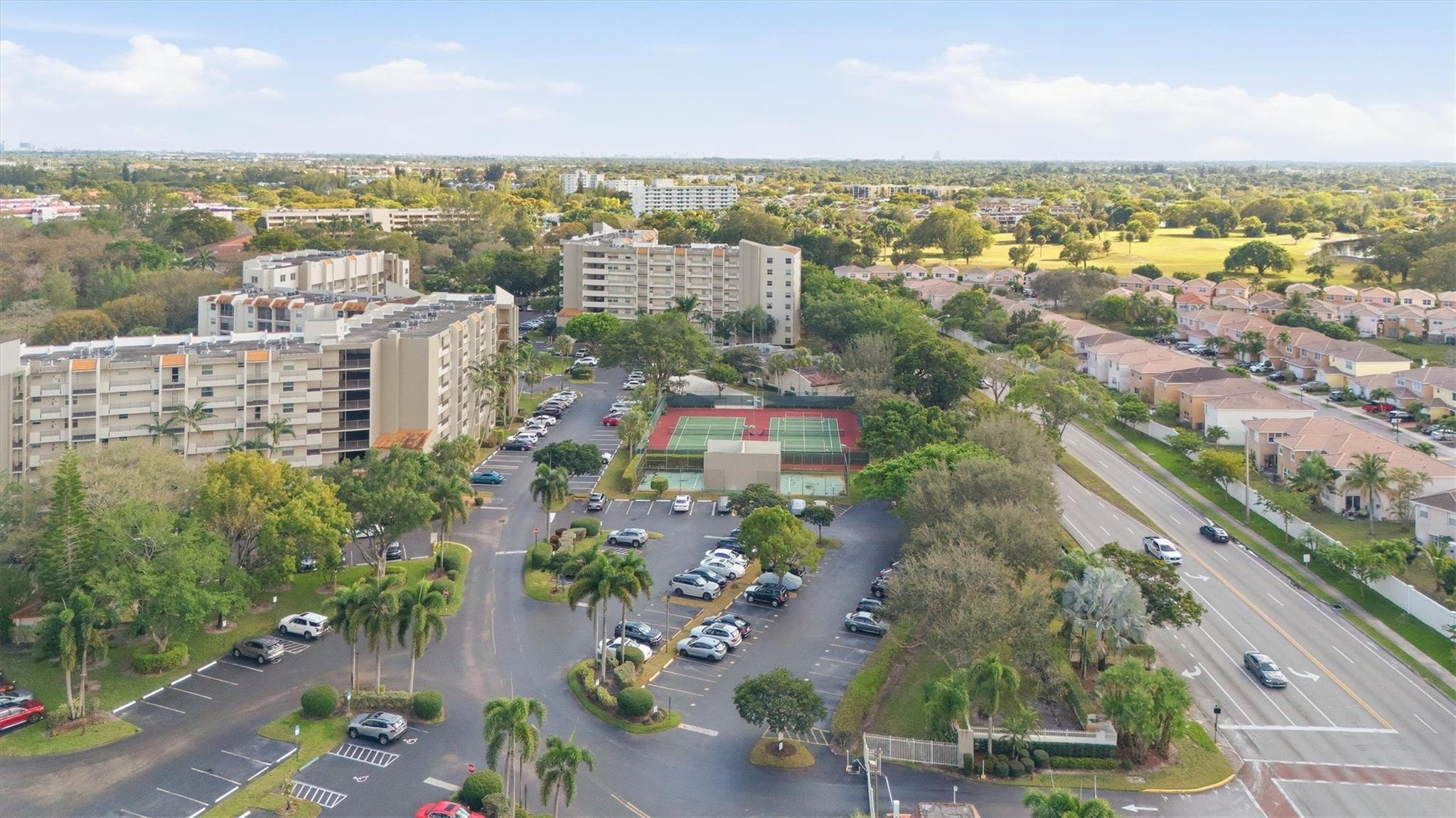 3910 Inverrary Boulevard, Unit 708B Lauderhill, FL 33319 - Photo 46 of 58 an aerial view of city and lake