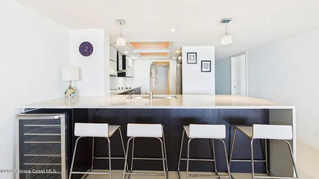 a bathroom with a sink a mirror and shower