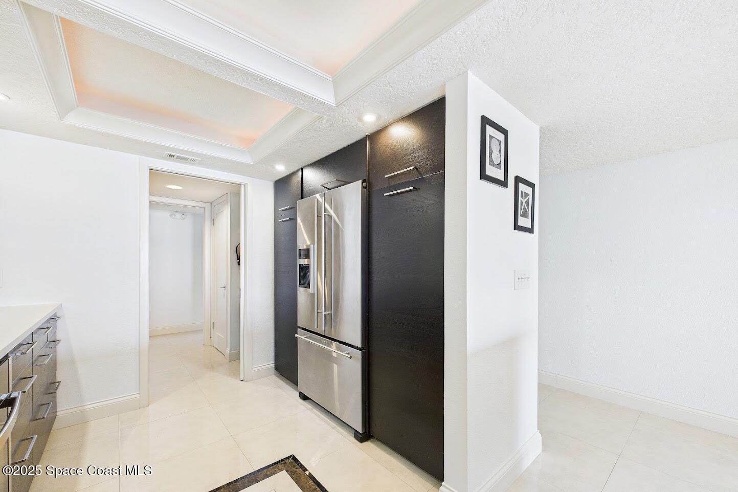 55 North 4th Street, Unit 401 Cocoa Beach, FL 32931 - Photo 21 of 34 a bathroom with a shower and a glass door