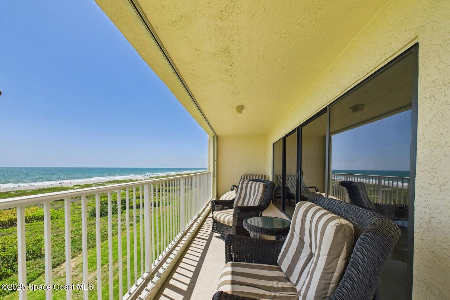 55 North 4th Street, Unit 401 Cocoa Beach, FL 32931 - Photo 6 of 34 a view of balcony with furniture
