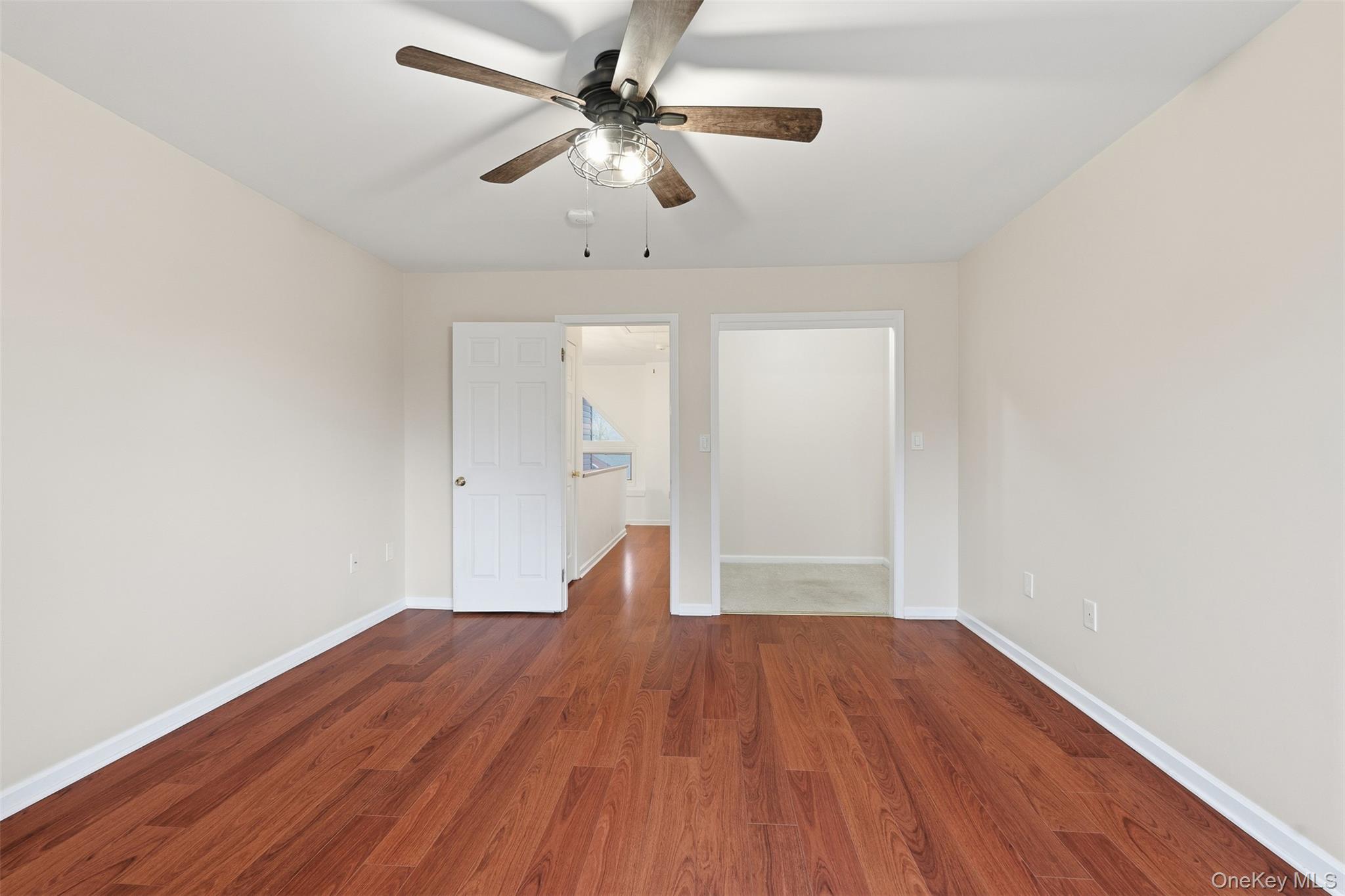 17 Knoll View Ossining, NY 10562 - Photo 22 of 34 wooden floor in an empty room with a window