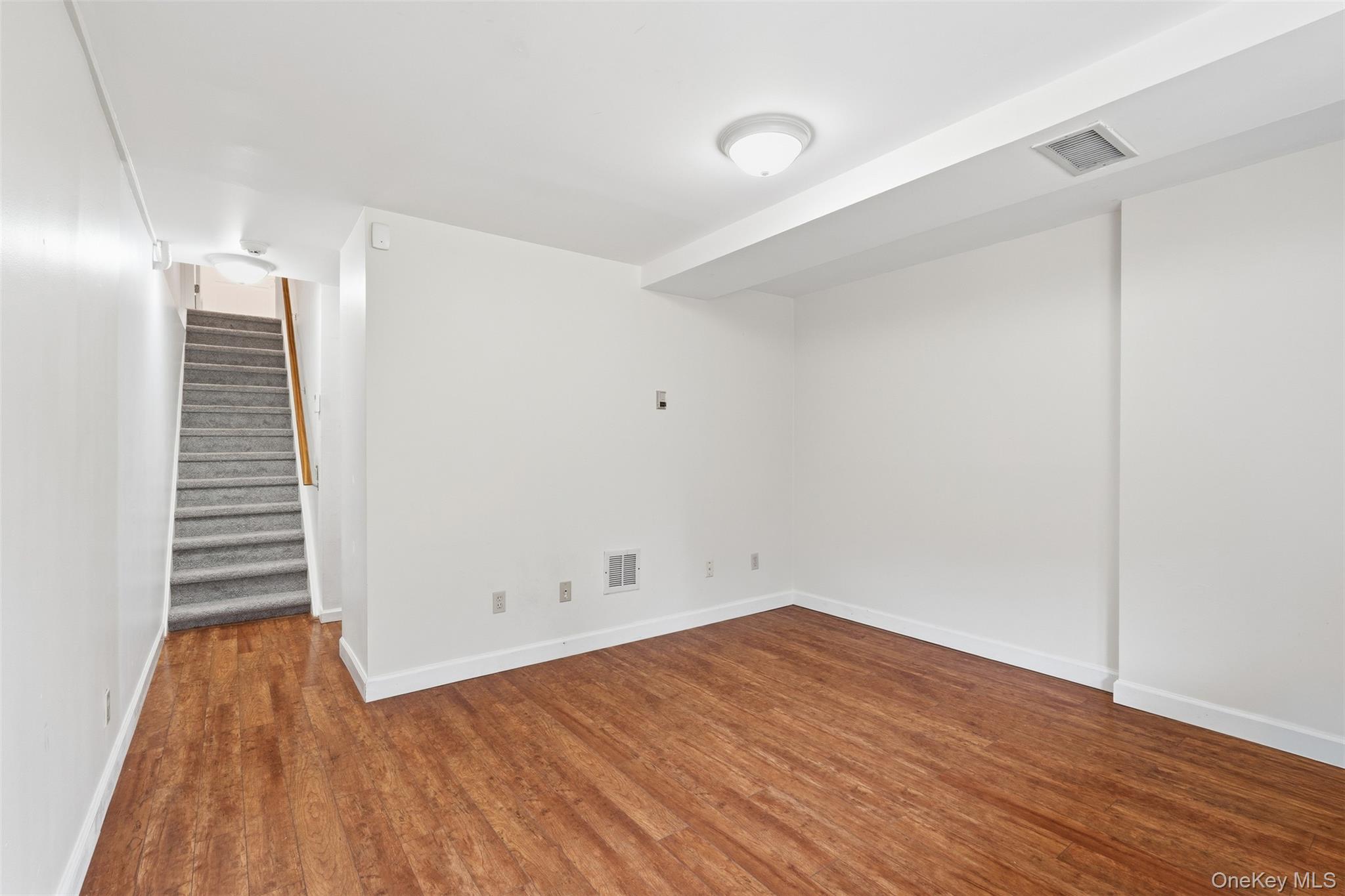 17 Knoll View Ossining, NY 10562 - Photo 30 of 34 an empty room with wooden floor