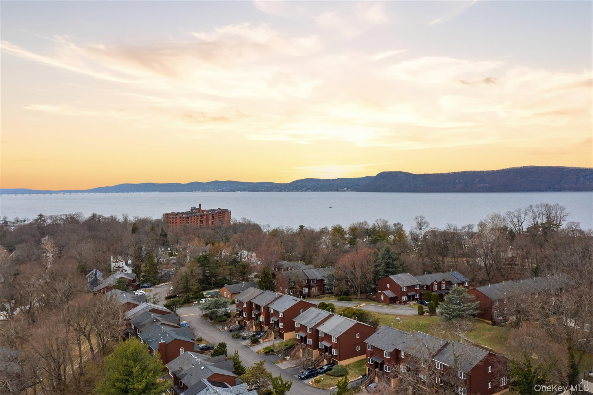17 Knoll View Ossining, NY 10562 - Photo 4 of 34 a view of a city with lots of residential buildings and mountain view in back