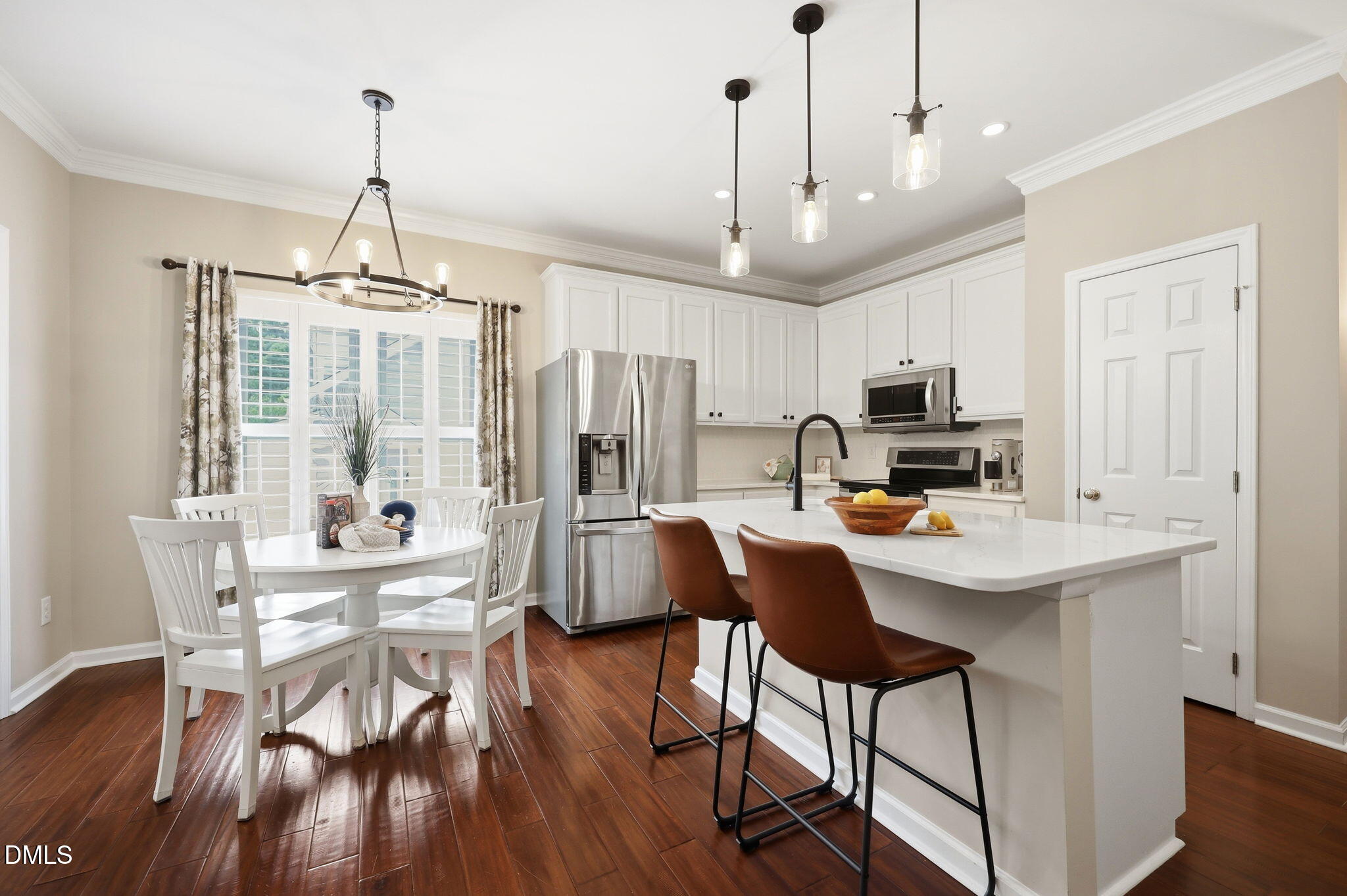 1716 Farmington Grove Drive Raleigh, NC 27614 - Photo 11 of 41 a view of a dining room with furniture window and wooden floor