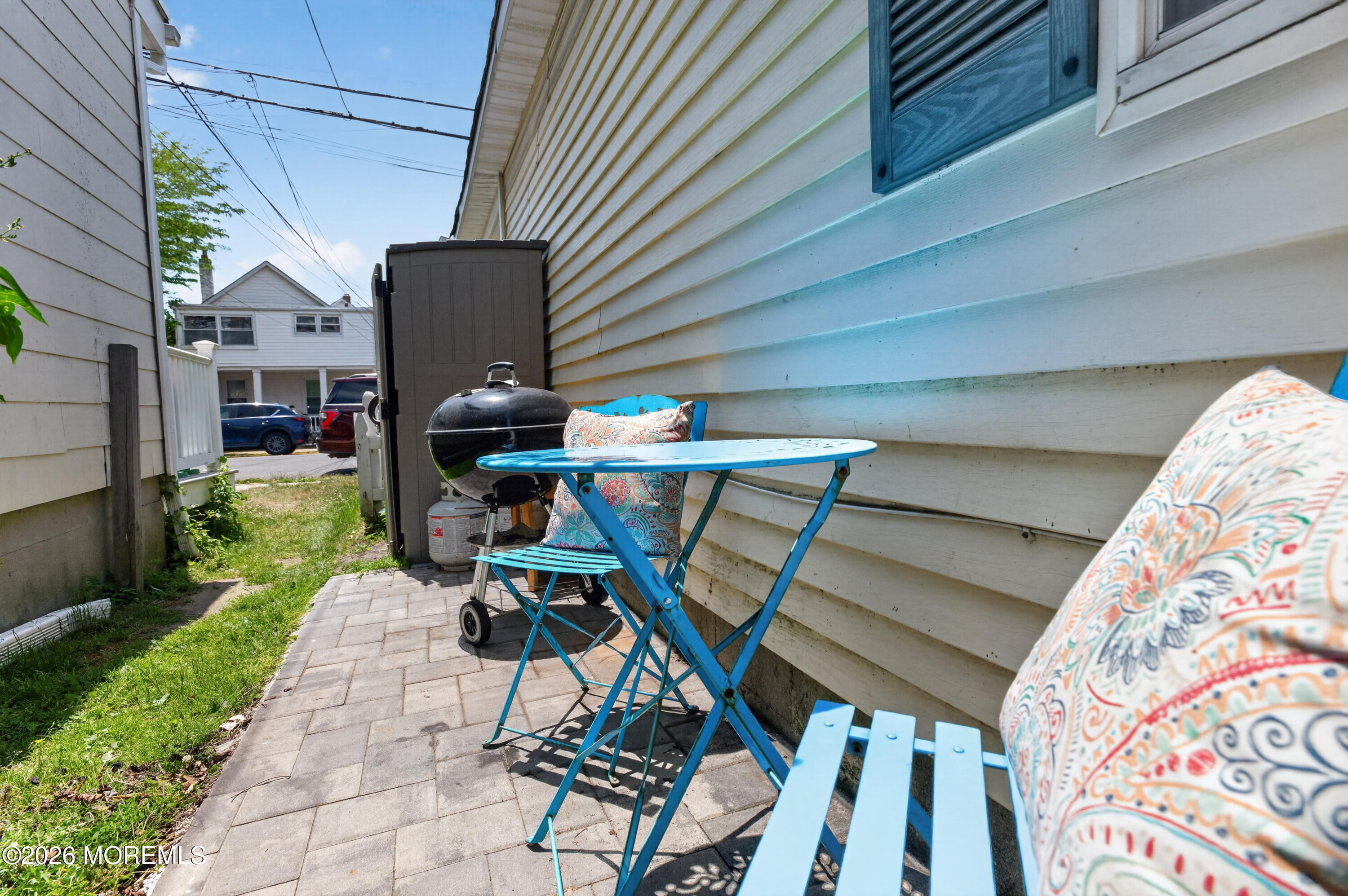 65 Heck Avenue Ocean Grove, NJ 07756 - Photo 30 of 37 a view of a chairs and table in a patio