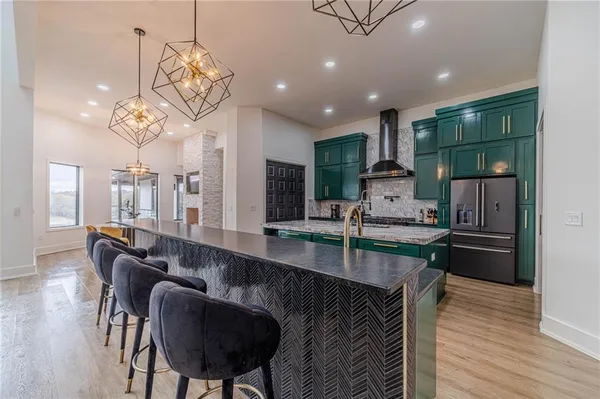 a kitchen with a stove and a sink