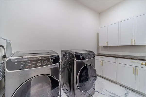 a bathroom with a shower and a bathtub
