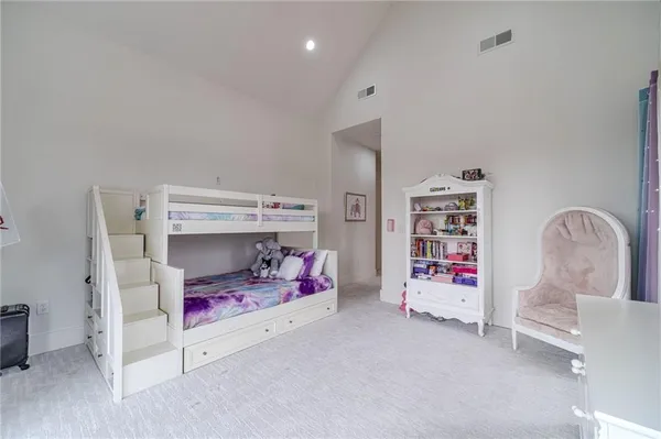 a bathroom with a tub and shower