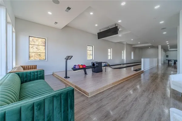 a view of swimming pool with a patio and a yard