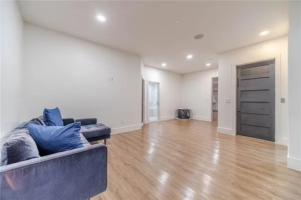 a view of a swimming pool with a yard